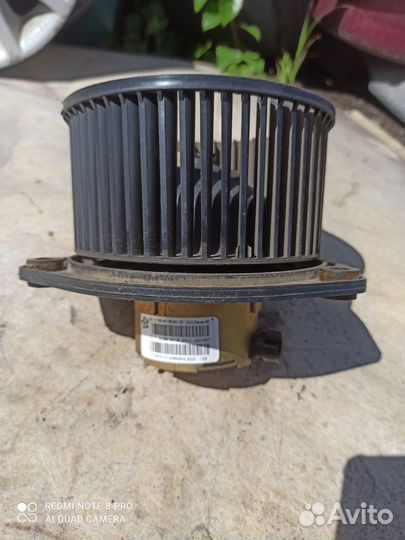 Моторчик отопителя печки Chevrolet Niva