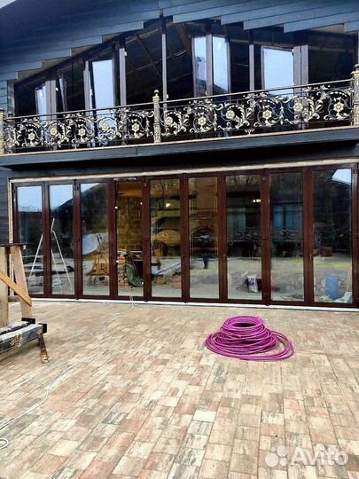 Раздвижное остекление терассы веранды беседки