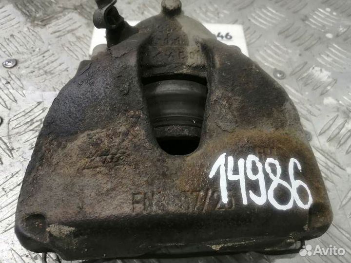 Суппорт тормозной передний правый Opel Astra G