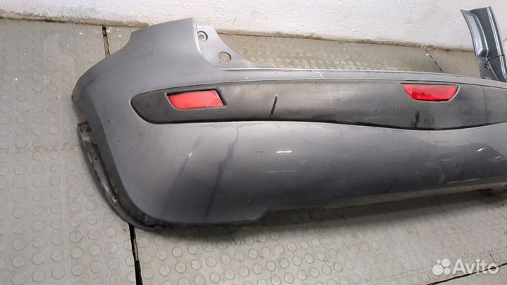 Бампер задний Nissan Note E11, 2006