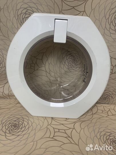 Люк стиральной машины Ariston