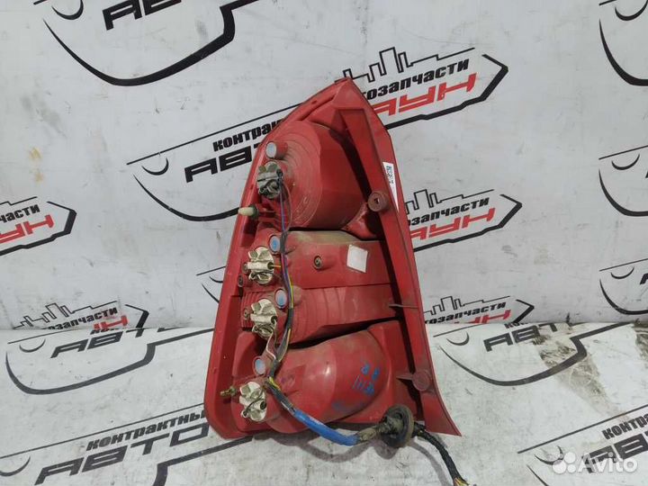 Фонарь chevrolet suzuki forenza lacetti optra J200