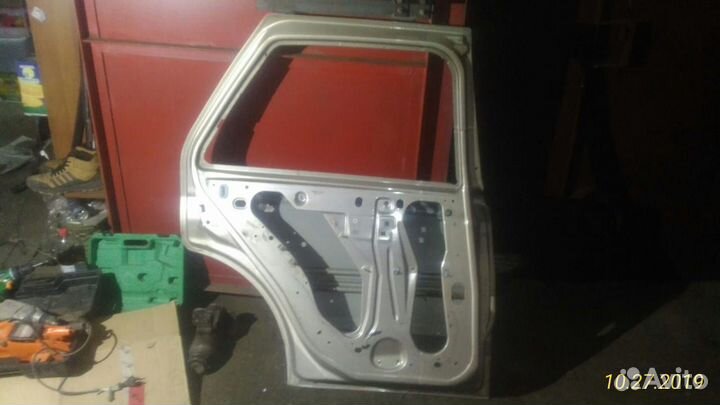 Дверь задняя левая SRX 03-10