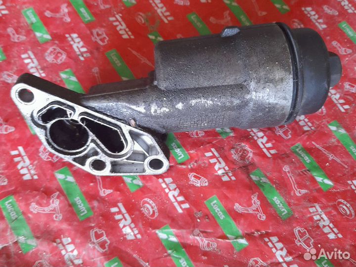 Корпус масляного фильтра Опель Корса D