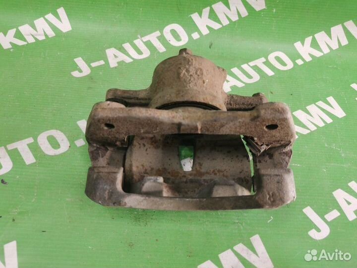 Суппорт передний правый Toyota Corolla E140