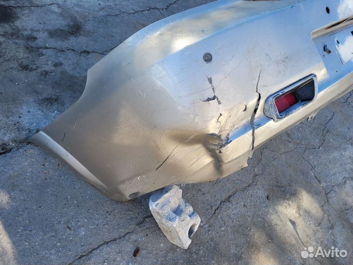 Бампер задний на Nissan Almera B10