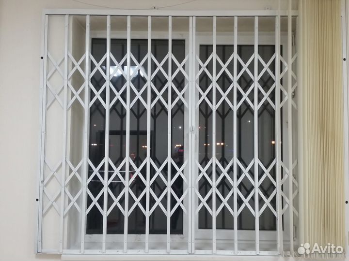 Раздвижные металлические решетки на окна