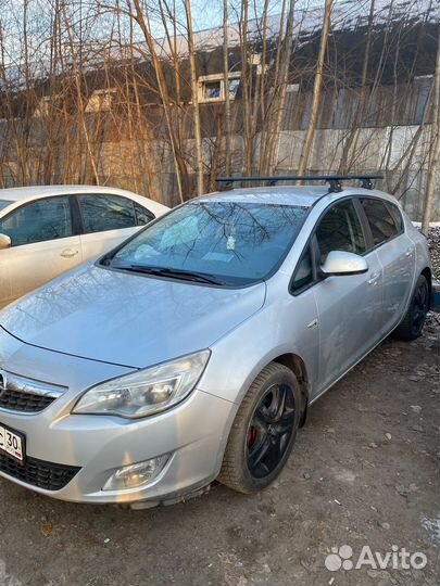 Багажник на крышу Opel astra j thule