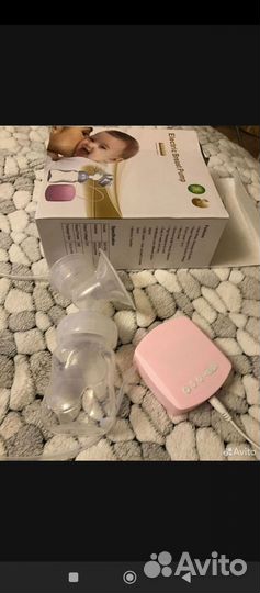 Молокоотсос электрический новый