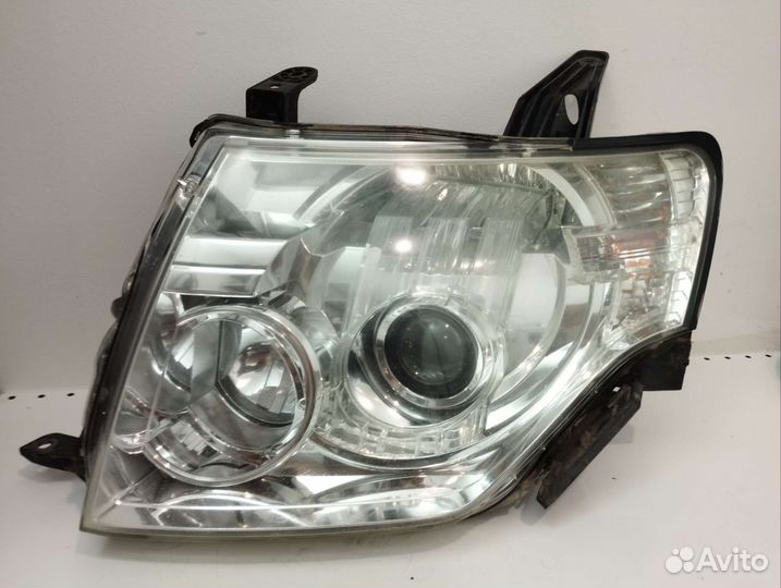 Фара левая Паджеро 4