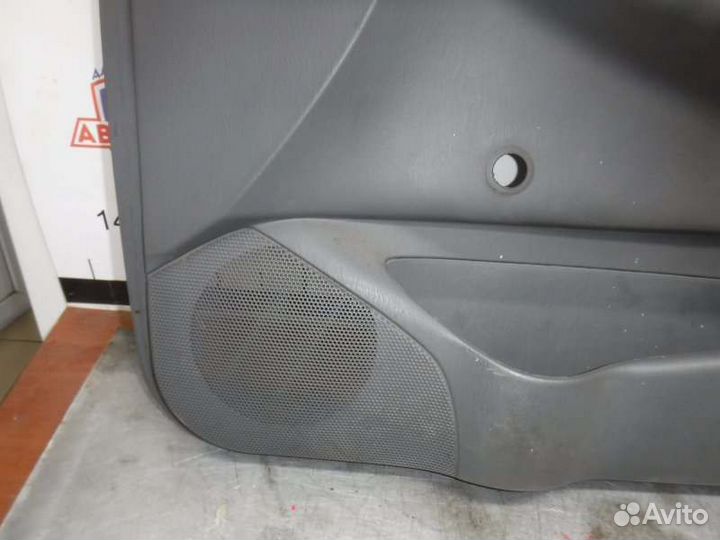 Обшивка двери передняя правая Toyota Corolla 124