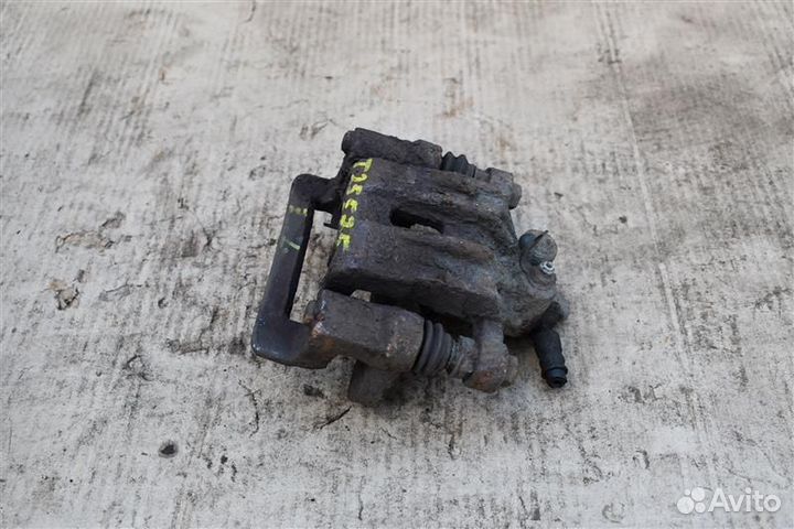 Суппорт тормозной задний левый Kia Sportage 2