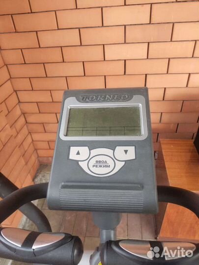 Эллиптический тренажер torneo