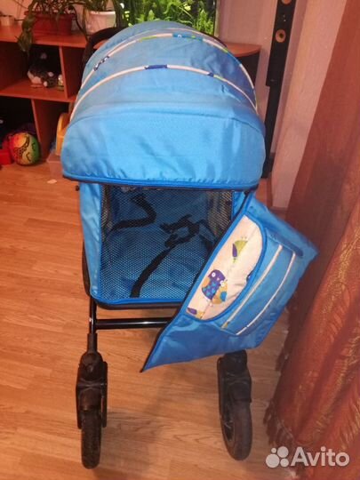 Коляска трансформер с поворотными колесами