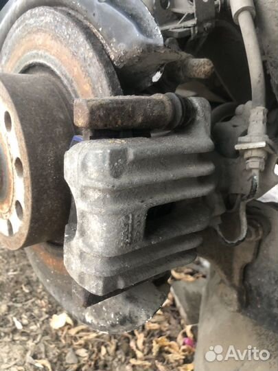 Суппорт задний правый Volkswagen Jetta 6