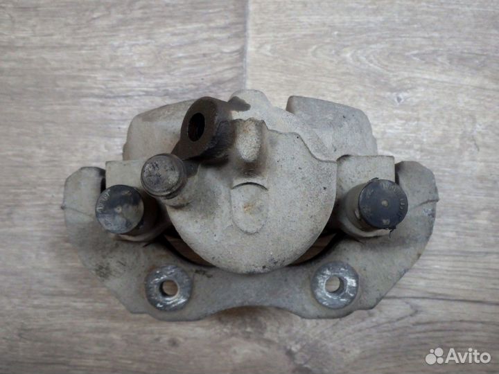 Суппорт тормозной передний левый Focus Фокус 2