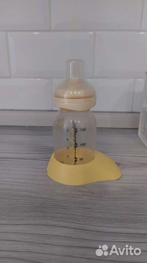 Молокоотсос ручной и Смартсоска medela