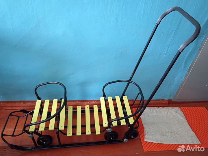 Детские санки на колёсиках для двойни