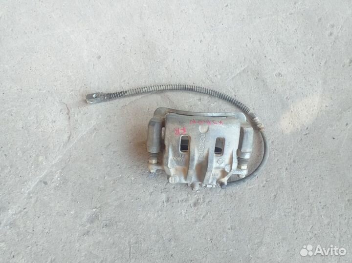 Суппорт тормозной передний SsangYong Kyron