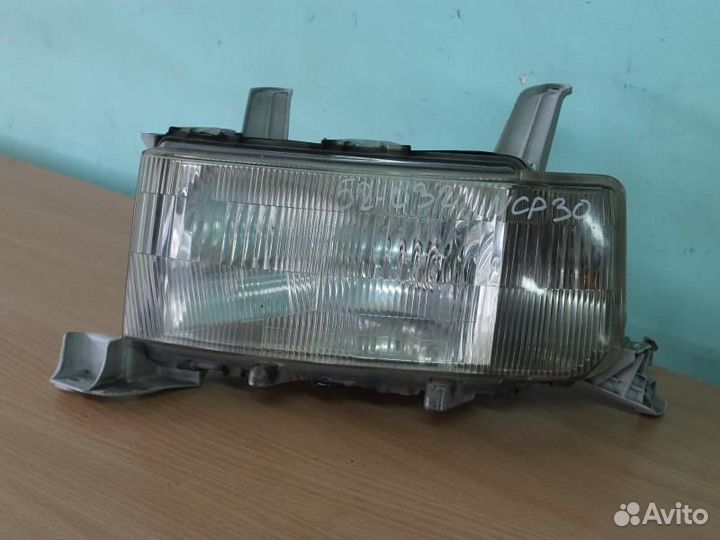 Фара левая Тойота Биби NCP30 52-032 А063