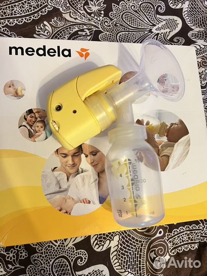 Молокоотсос medela mini электрический