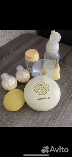 Молокоотсос medela электрический