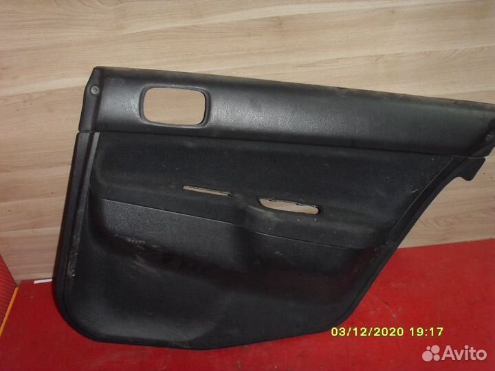 Обшивка задней двери MR444252 Mitsubishi Lancer 9