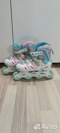 Роликовые коньки