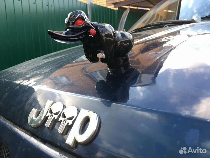 Злая утка на капот