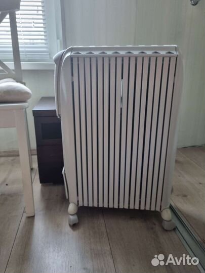 Масляный обогреватель delonghi