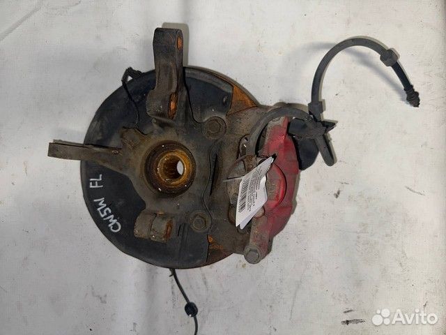 Кулак поворотный левый Mitsubishi Outlander XL