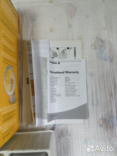 Молокоотсос medela электрический