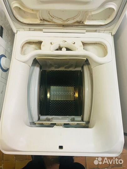 Стиральная машина AEG с вертикальной загрузкой