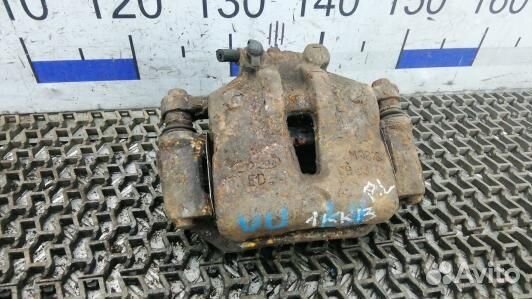 Суппорт тормозной передний левый KIA CEE'D 1 (1KK1