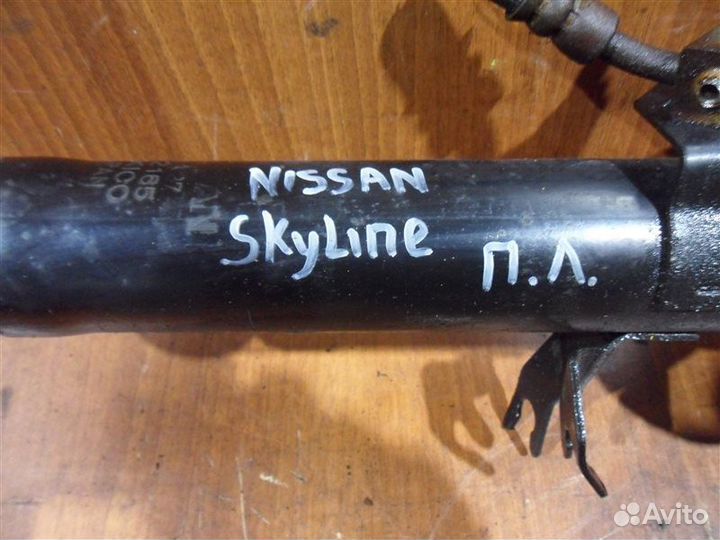 Амортизатор передний левый Nissan Skyline KV36