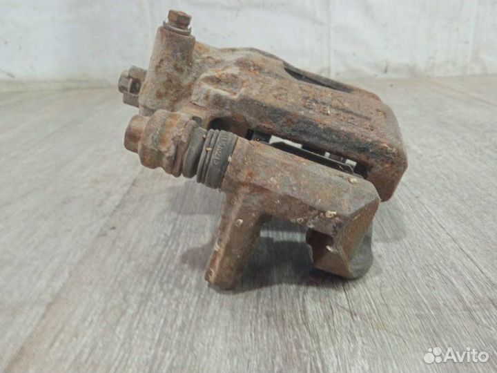 Суппорт передний правый Chevrolet Aveo T250 2008