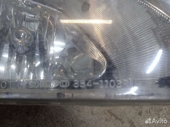 Фара Dodge Caravan 2003-06-07