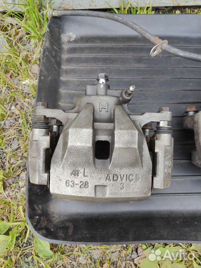 Суппорт передний контрактный Toyota Camry XV40