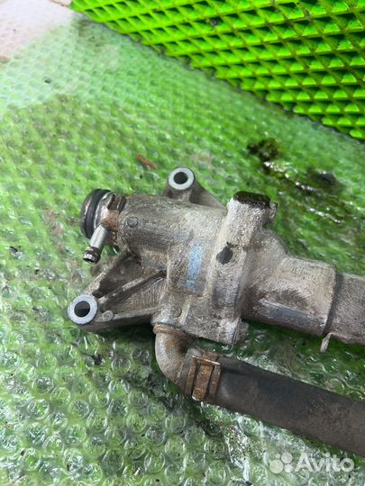 Корпус термостата Suzuki Swift 2004-2010