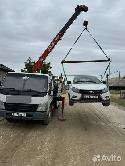 Эвакуация автомобиля с траверсой