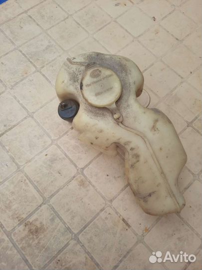 Бачок омывателя в сборе на дэу эсперо