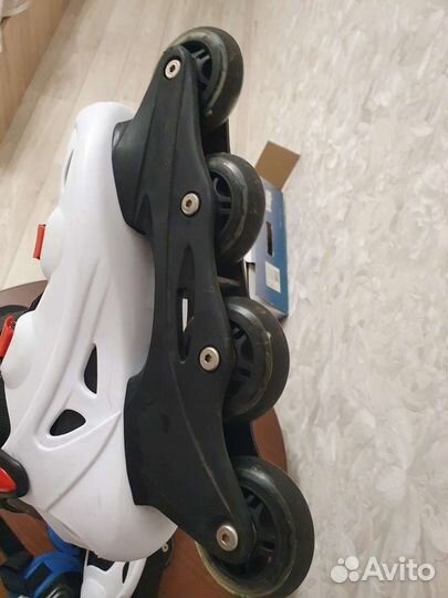 Роликовые коньки