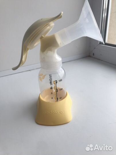 Молокоотсос medela ручной