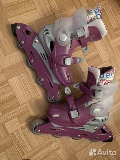 Роликовые коньки