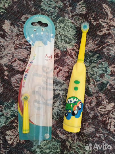 Детская электрическая щетка с новой насадкой