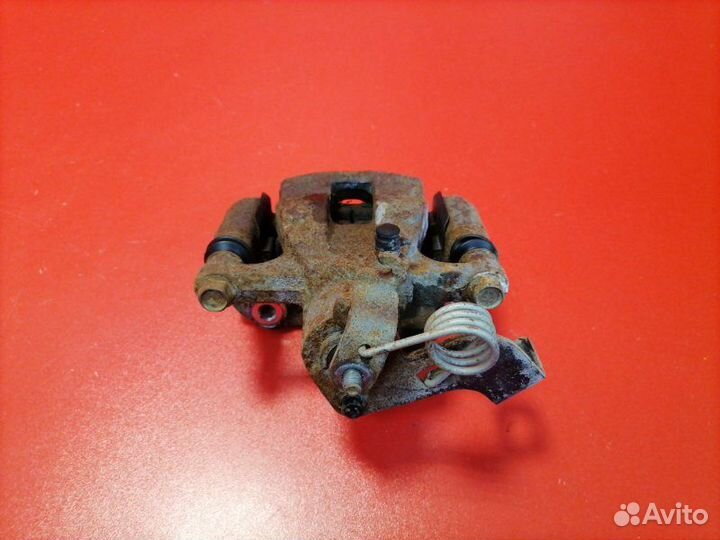 Суппорт задний левый Hyundai Solaris RB G4FA 2011