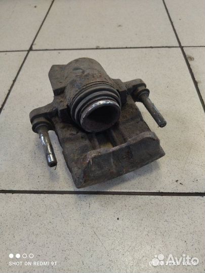 Суппорт тормозной передний левый Renault Symbol