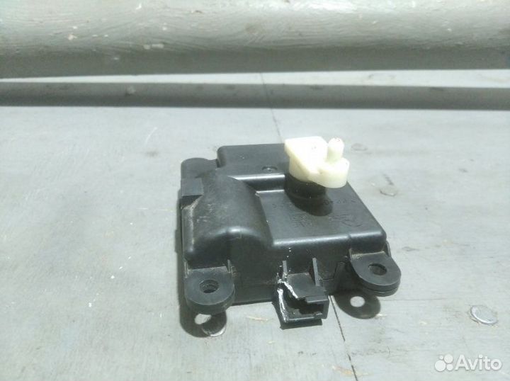 Моторчик заслонки отопителя Nissan Almera Classic