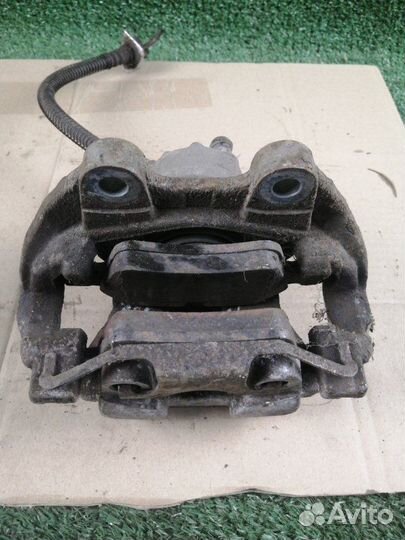 Суппорт тормозной задний левый Mercedes-Benz