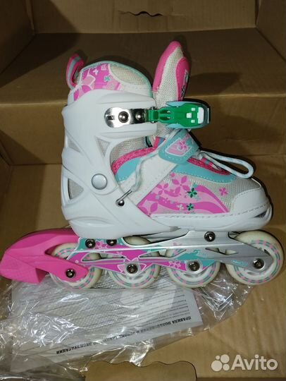 Роликовые коньки